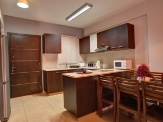 Kitchen of three bedroom apartment at Paphos Aphrodite Sands Resort