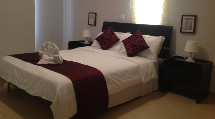 King Size Bed of two bedroom apartment at Paphos Aphrodite Sands Resort